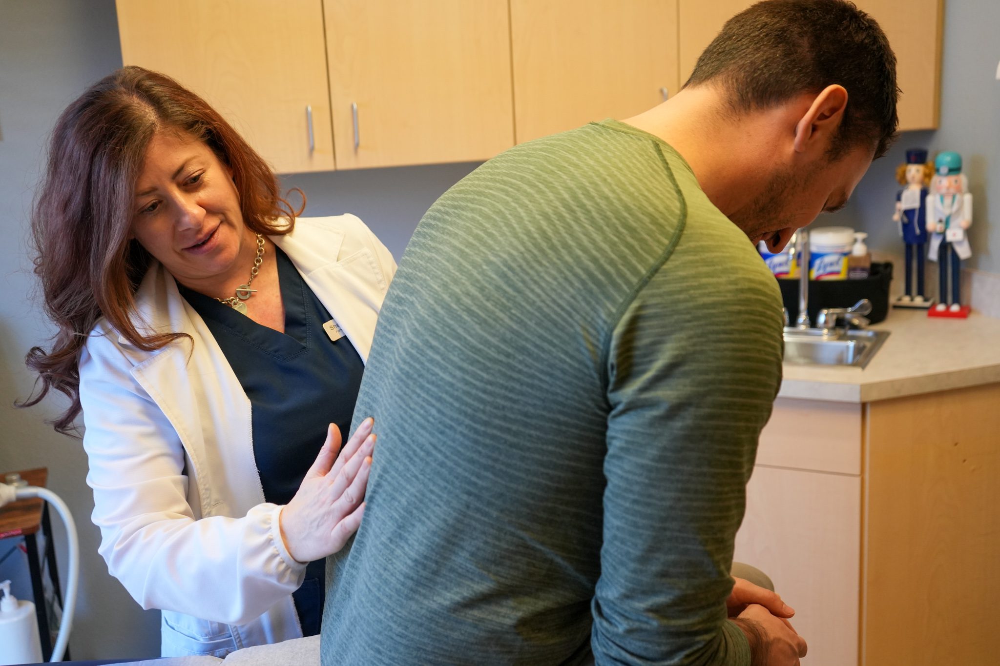 Primary Care Physician treats patient in primary care office in Greeley Colorado.